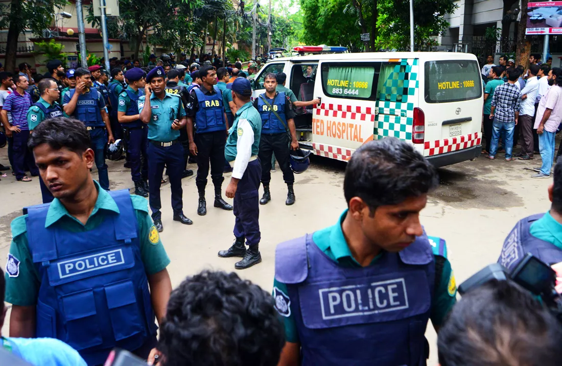 bangladeshi police man an intersection of a street leading to an upscale restaurant after a bloody siege ended in dhaka on july 2 2016 photo afp bangladeshi police man an intersection of a street leading to an upscale restaurant after a bloody siege ended in dhaka on july 2 2016 photo afp