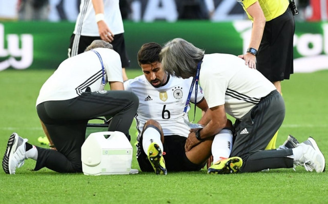 germany 039 s midfielder sami khedira is examined during the euro 2016 quarter final football match between germany and italy at the matmut atlantique stadium in bordeaux on july 2 2016 photo afp