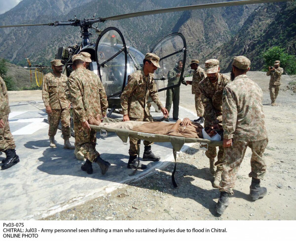 personnel of pakistan army shift a man injured during the floods in chitral khyber pakhtunkhwa on july 3 2016 photo online personnel of pakistan army shift a man injured during the floods in chitral khyber pakhtunkhwa on july 3 2016 photo online