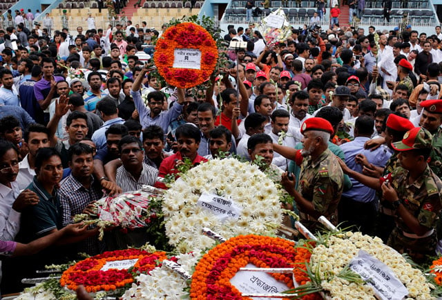 people pay tribute to the victims of the attack on the holey artisan bakery and the o 039 kitchen restaurant in dhaka bangladesh july 4 2016 photo reuters