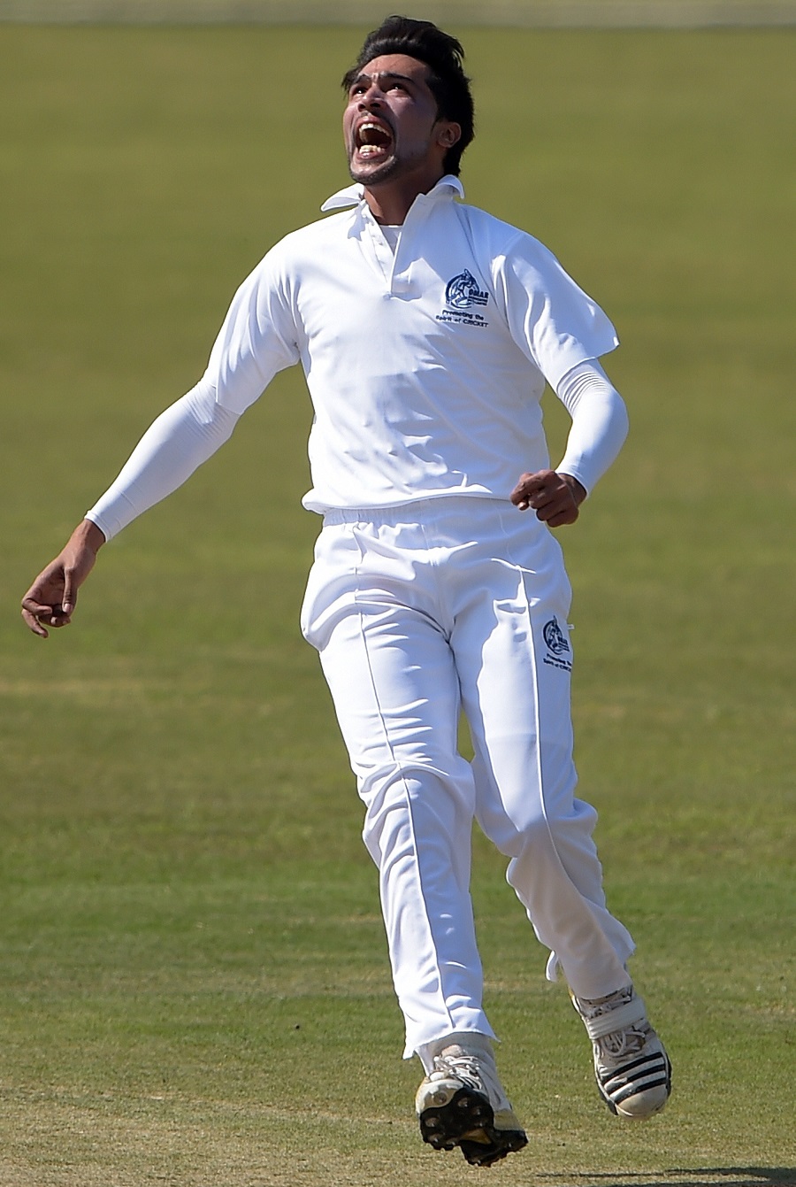 pakistani pacer mohammad aamer celebrates taking a wicket during a three day match at the pindi cricket stadium in rawalpindi on march 13 2015 pakistani fast bowler mohammad aamer showed no signs of rustiness as he made his return after a five year spot fixing ban bagging three wickets in his first spell in competitive cricket since 2010 photo afp