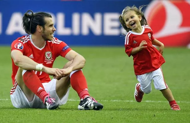 gareth bale sits with daughter running round damien meyer photo afp gareth bale sits with daughter running round damien meyer photo afp