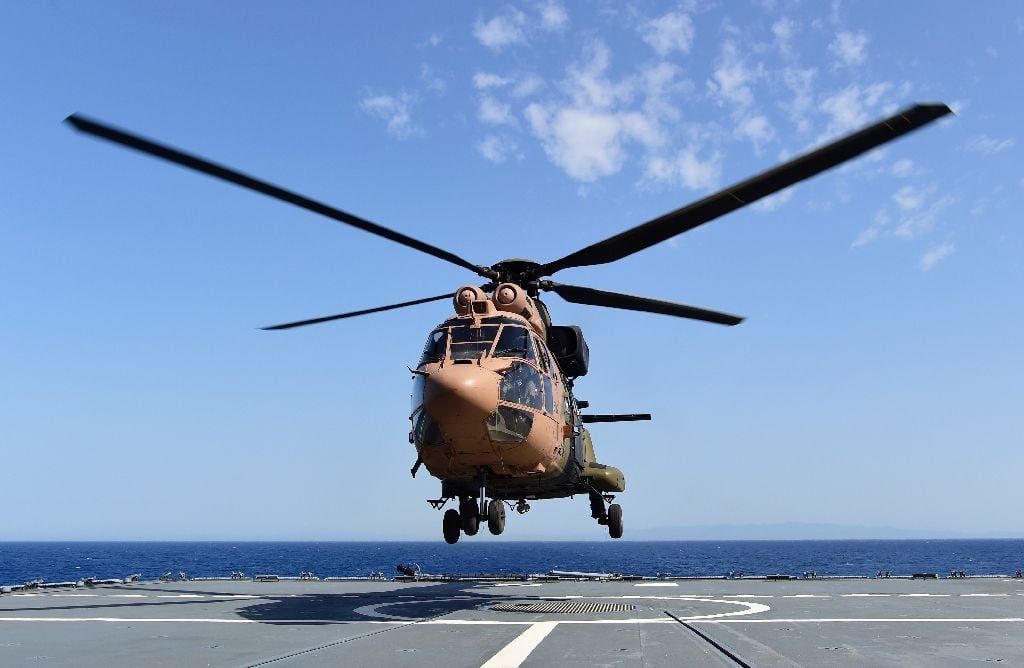 this file photo shows a transport helicopter of the turkish air force on a navy support ship in the aegean sea off the turkish coast on april 20 2016 this file photo shows a transport helicopter of the turkish air force on a navy support ship in the aegean sea off the turkish coast on april 20 2016 photo afp