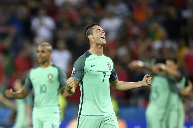 portugal 039 s forward cristiano ronaldo celebrates after portugal beat wales 2 0 in the euro 2016 semi final football match between portugal and wales at the parc olympique lyonnais stadium in d cines charpieu near lyon on july 6 2016 photo afp portugal 039 s forward cristiano ronaldo celebrates after portugal beat wales 2 0 in the euro 2016 semi final football match between portugal and wales at the parc olympique lyonnais stadium in d cines charpieu near lyon on july 6 2016 photo afp