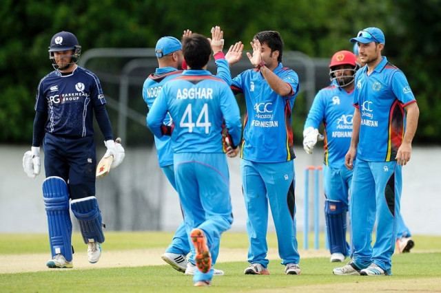 afghanistan 039 s players celebrate taking the wicket of scotland 039 s craig wallace l for 33 runs during the 2nd one day cricket international odi between scotland and afghanistan at the grange in edinburgh scotland on july 6 2016 photo afp afghanistan 039 s players celebrate taking the wicket of scotland 039 s craig wallace l for 33 runs during the 2nd one day cricket international odi between scotland and afghanistan at the grange in edinburgh scotland on july 6 2016 photo afp