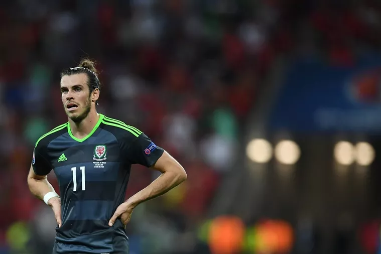 wales 039 forward gareth bale reacts at the end of the euro 2016 semi final football match between portugal and wales at the parc olympique lyonnais stadium in d cines charpieu near lyon on july 6 2016 photo afp wales 039 forward gareth bale reacts at the end of the euro 2016 semi final football match between portugal and wales at the parc olympique lyonnais stadium in d cines charpieu near lyon on july 6 2016 photo afp