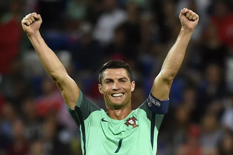 portugal 039 s forward cristiano ronaldo reacts as portugal clinches the match 2 0 against wales in the euro 2016 semi final football match between portugal and wales at the parc olympique lyonnais stadium in d cines charpieu near lyon on july 6 2016 photo afp portugal 039 s forward cristiano ronaldo reacts as portugal clinches the match 2 0 against wales in the euro 2016 semi final football match between portugal and wales at the parc olympique lyonnais stadium in d cines charpieu near lyon on july 6 2016 photo afp