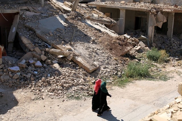 a general view shows damaged buildings in the rebel held town of dael in deraa governorate syria on july 7 photo reuters