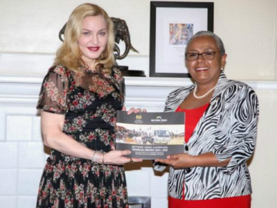 madonna moved to tears over kenya child rape