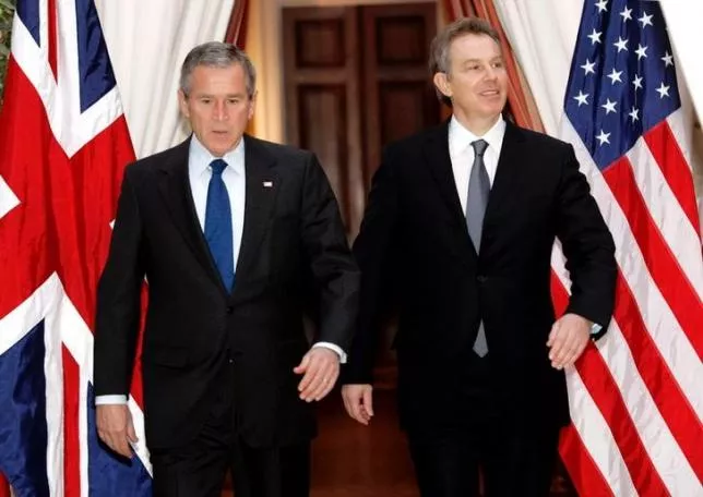 us president george w bush l and british prime minister tony blair walk together from their meeting at the us embassy in brussels february 22 2005 photo reuters us president george w bush l and british prime minister tony blair walk together from their meeting at the us embassy in brussels february 22 2005 photo reuters