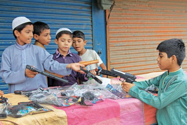 activists warn of the negative effects of letting children play with guns photo aysha saleem express activists warn of the negative effects of letting children play with guns photo aysha saleem express