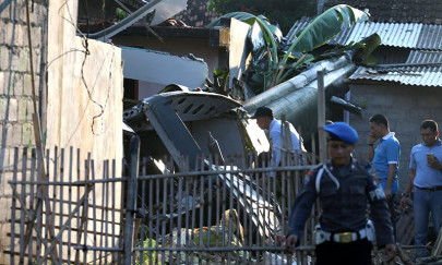 at least two dead in indonesian military chopper crash