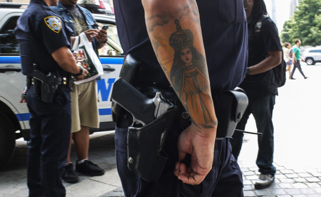 new york police department nypd officers patrol in central park on july 8 2016 in new york city the nypd increased their presence around the city following the shooting deaths of five dallas police officers during a black lives matters demonstration on july 7 photo afp
