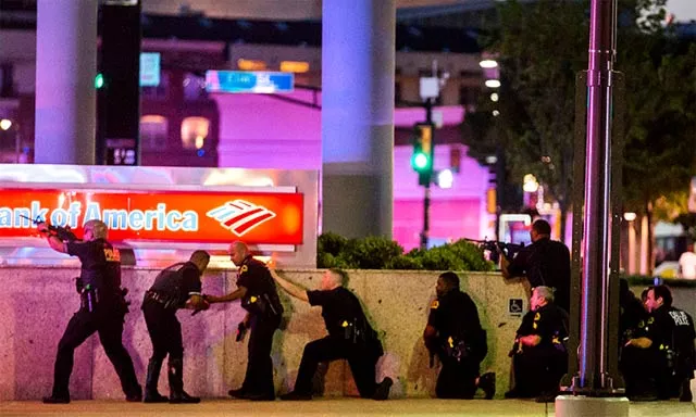 dallas police dept tweet photograph of suspect dressed in a camouflage shirt with an assault rifle on his shoulder photo source dallas morning news dallas police dept tweet photograph of suspect dressed in a camouflage shirt with an assault rifle on his shoulder photo source dallas morning news