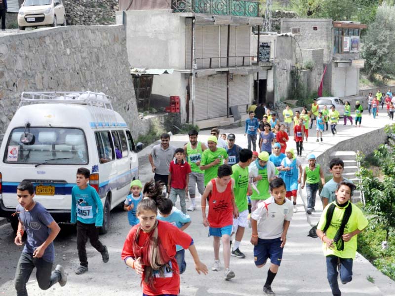 marathon under way in hunza photo express