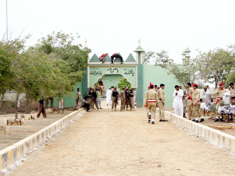 around 25 years ago edhi expressed the wish to be buried next to mystic mirza munawar ali baig alharis mansoor aman gesudaraz photo aysha saleem express