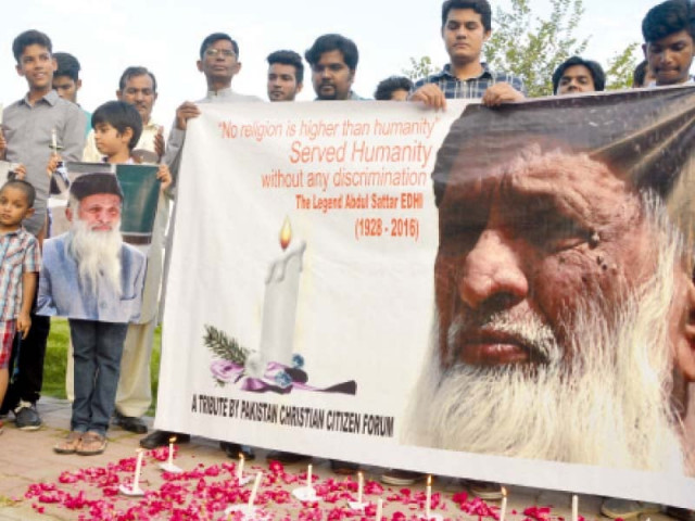 candlelight vigils were arranged by various civil society groups while a wall of kindness with a mural of edhi became a makeshift shrine photos mudassar raja express candlelight vigils were arranged by various civil society groups while a wall of kindness with a mural of edhi became a makeshift shrine photos mudassar raja express