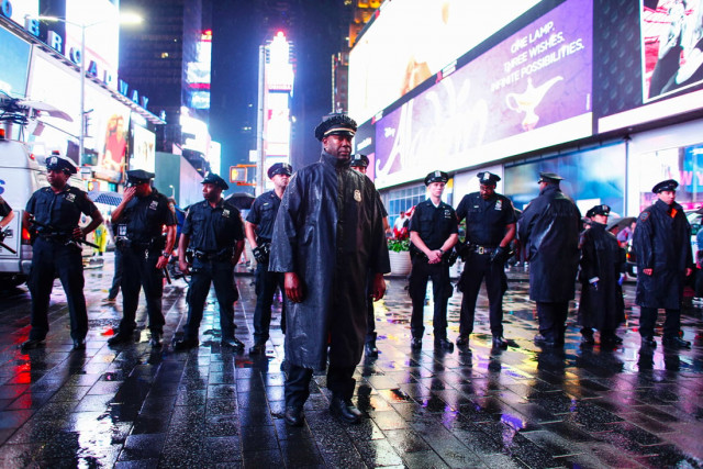 police officers stand guard during a protest in times square in support of the black lives matter movement in new york on july 09 2016 photo afp