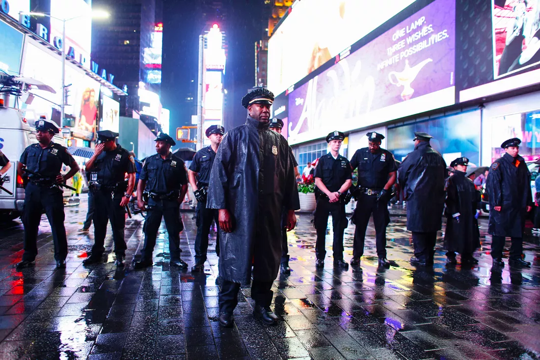 police officers stand guard during a protest in times square in support of the black lives matter movement in new york on july 09 2016 photo afp police officers stand guard during a protest in times square in support of the black lives matter movement in new york on july 09 2016 photo afp