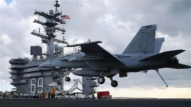 an f18 super hornet prepares to land on the deck of the uss eisenhower off the coast of virginia december 10 2015 in the atlantic ocean photo afp an f18 super hornet prepares to land on the deck of the uss eisenhower off the coast of virginia december 10 2015 in the atlantic ocean photo afp