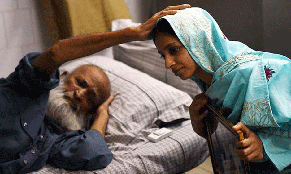 in this file photo geeta is seen with abdul sattar edhi in karachi on october 15 2015 photo afp