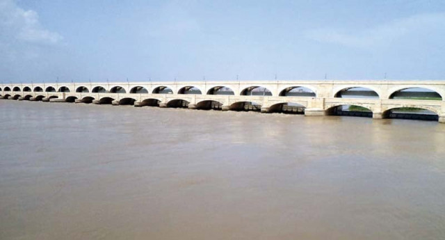 a view of sukkur barrage surrounded by flood water photo file