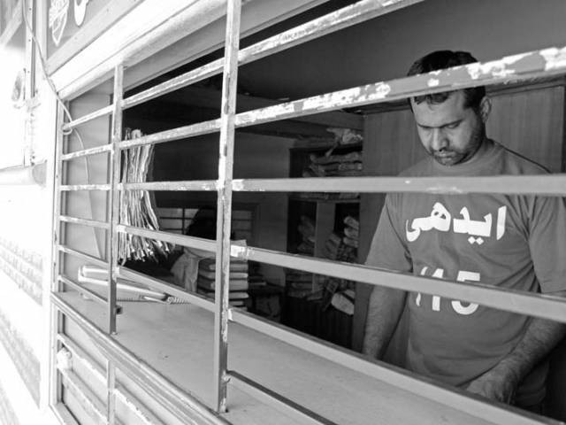 an attendant stands at the reception where people come to register bodies photo ayesha mir express an attendant stands at the reception where people come to register bodies photo ayesha mir express