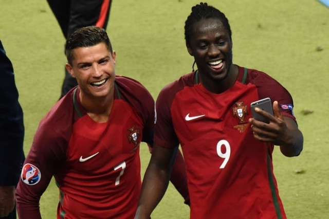 portugal 039 s forward cristiano ronaldo l and portugal 039 s forward eder take a selfie as they arrive to receive their medals after the euro 2016 final football match between portugal and france at the stade de france in saint denis north of paris on july 10 2016 photo afp portugal 039 s forward cristiano ronaldo l and portugal 039 s forward eder take a selfie as they arrive to receive their medals after the euro 2016 final football match between portugal and france at the stade de france in saint denis north of paris on july 10 2016 photo afp