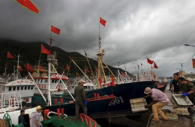 fishermen arrange baskets as they prepare before typhoon soudelor hits wenzhou zhejiang province august 7 2015 photo reuters fishermen arrange baskets as they prepare before typhoon soudelor hits wenzhou zhejiang province august 7 2015 photo reuters