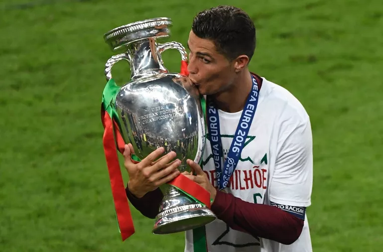 portugal 039 s forward cristiano ronaldo kisses the trophy after the team 039 s 1 0 win in the euro 2016 final football match between portugal and france at the stade de france in saint denis north of paris on july 10 2016 photo afp portugal 039 s forward cristiano ronaldo kisses the trophy after the team 039 s 1 0 win in the euro 2016 final football match between portugal and france at the stade de france in saint denis north of paris on july 10 2016 photo afp