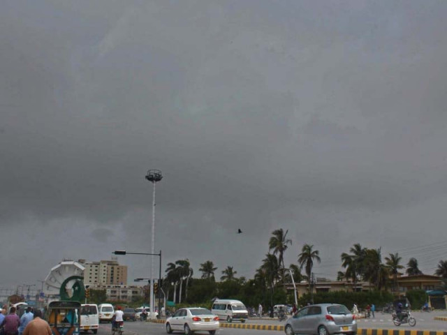 dark skies paid karachi a visit on monday afternoon the city is bracing for moderate to heavy rainfall starting tuesday night photo mohammad azeem express