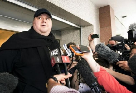 german tech entrepreneur kim dotcom speaks to the press after appearing in an auckland courthouse photo reuters