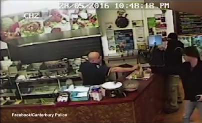 new zealand shop owner ignores pistol wielding robber serves customer instead new zealand shop owner ignores pistol wielding robber serves customer instead