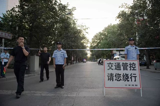 chinese police officers block the road leading to the philippines embassy in beijing on july 12 2016 photo afp chinese police officers block the road leading to the philippines embassy in beijing on july 12 2016 photo afp