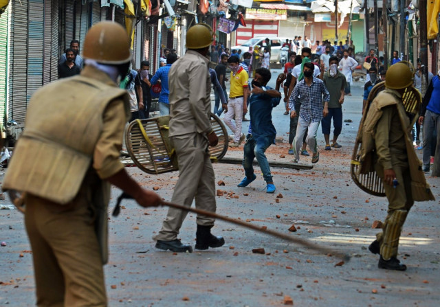 indian police clash with kashmiri protestors in srinagar on july 11 2016 afp photo