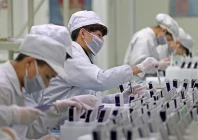 workers are seen at a production line manufacturing solar photovoltaic components at a factory in huzhou zhejiang province china february 12 2019 photo reuters