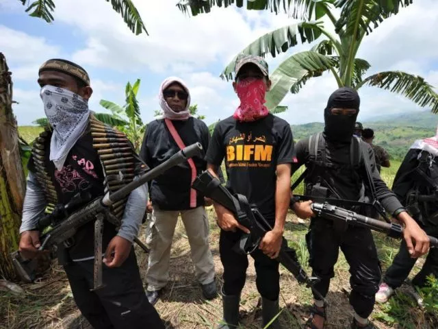 picture shows gurellias in philippines photo afp picture shows gurellias in philippines photo afp