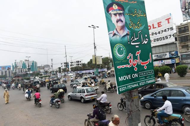 campaigners set up banners urging general raheel to impose martial law and take control of the country photo afp campaigners set up banners urging general raheel to impose martial law and take control of the country photo afp