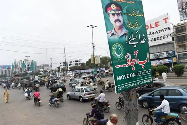 campaigners set up banners urging general raheel to impose martial law and take control of the country photo afp campaigners set up banners urging general raheel to impose martial law and take control of the country photo afp