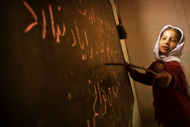 an afghan girl reads from the board in a home based school in kabul december photo reuters 2 2001 the school operating secretly for a year under the strict taliban regime has now opened its doors for all children ready to pay a small monthly fee pp03070097 reuters damir sagolj ds gb rtrq176 an afghan girl reads from the board in a home based school in kabul december photo reuters 2 2001 the school operating secretly for a year under the strict taliban regime has now opened its doors for all children ready to pay a small monthly fee pp03070097 reuters damir sagolj ds gb rtrq176