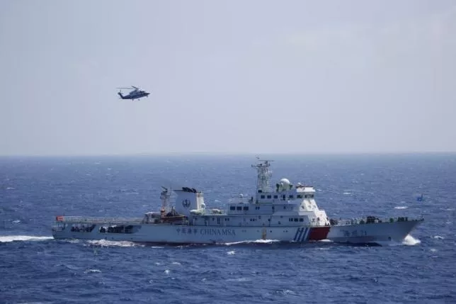 chinese ship and helicopter are seen during a search and rescue exercise near qilian yu subgroup in the paracel islands which is known in china as xisha islands south china sea july 14 2016 photo reuters chinese ship and helicopter are seen during a search and rescue exercise near qilian yu subgroup in the paracel islands which is known in china as xisha islands south china sea july 14 2016 photo reuters