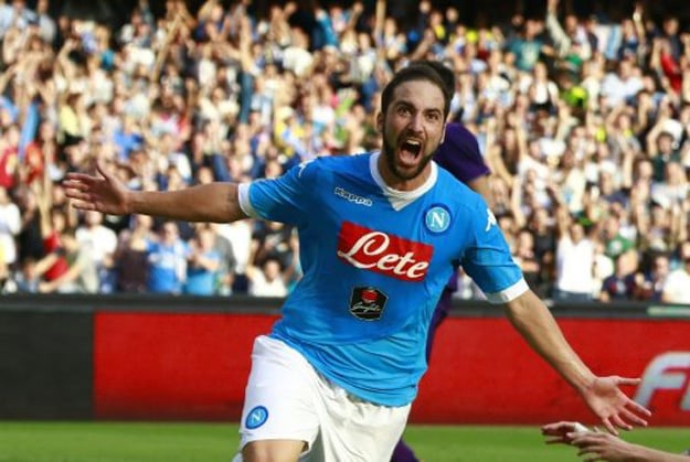 gonzalo higuain celebrates after scoring against fiorentina at the san paolo stadium in naples italy on october 18 2015 photo afp