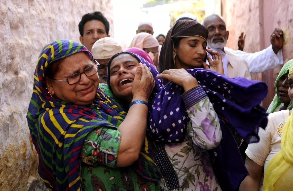 relatives mourn slain indian villager mohammad akhlaq in the village of bisada in the state of uttar pradesh after his death at the hands of a mob on september 29 2015 photo afp relatives mourn slain indian villager mohammad akhlaq in the village of bisada in the state of uttar pradesh after his death at the hands of a mob on september 29 2015 photo afp