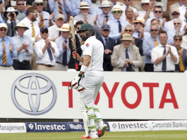 pakistan s captain misbahul haq acknowledges the crowd as he walks back to the pavillion after losing his wicket for 114 on the second day of the first test photo afp pakistan s captain misbahul haq acknowledges the crowd as he walks back to the pavillion after losing his wicket for 114 on the second day of the first test photo afp