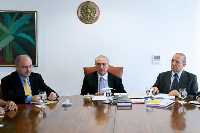 brazilian acting president michel temerat the planalto palace in brasilia discussing changes in the security structure of the rio 2016 olympic games photo afp