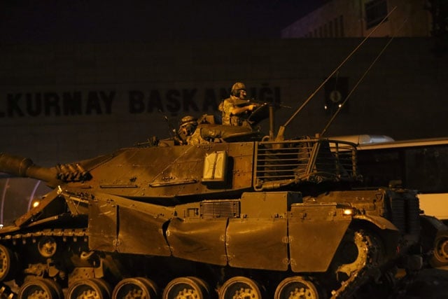 troops filed into taksim square uncertain of how they would be received before long angry crowds had gathered to denounce them photo afp