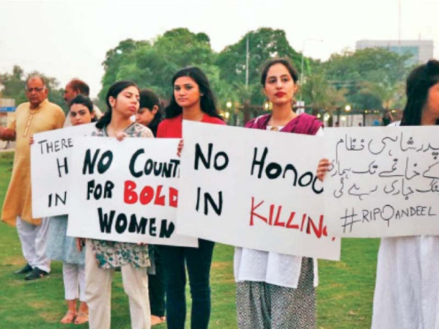 protesters carry placards against honour killing photo express protesters carry placards against honour killing photo express