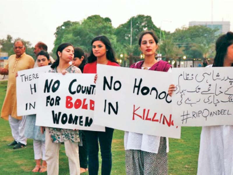 protesters carry placards against honour killing photo express