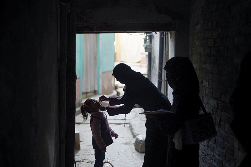 the target is to eliminate the virus in eight districts including peshawar bannu di khan tank karak kohat hangu and lakki marwat photo afp