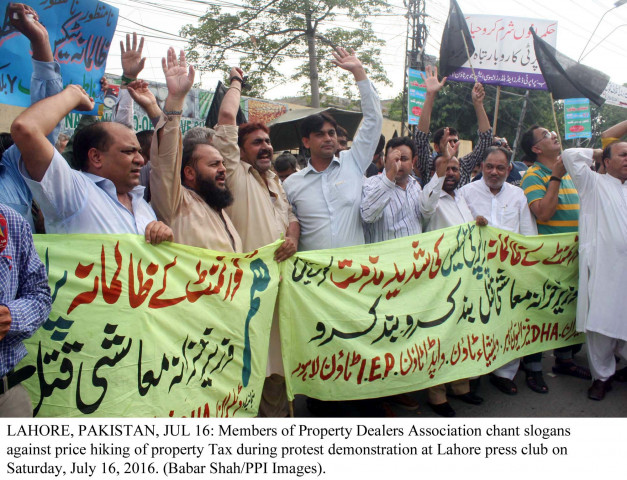 the government s decision to raise the tax on the sale and purchase of plots will discourage people from investing in it said dha dealers association president rafiq hasrat photo ppi